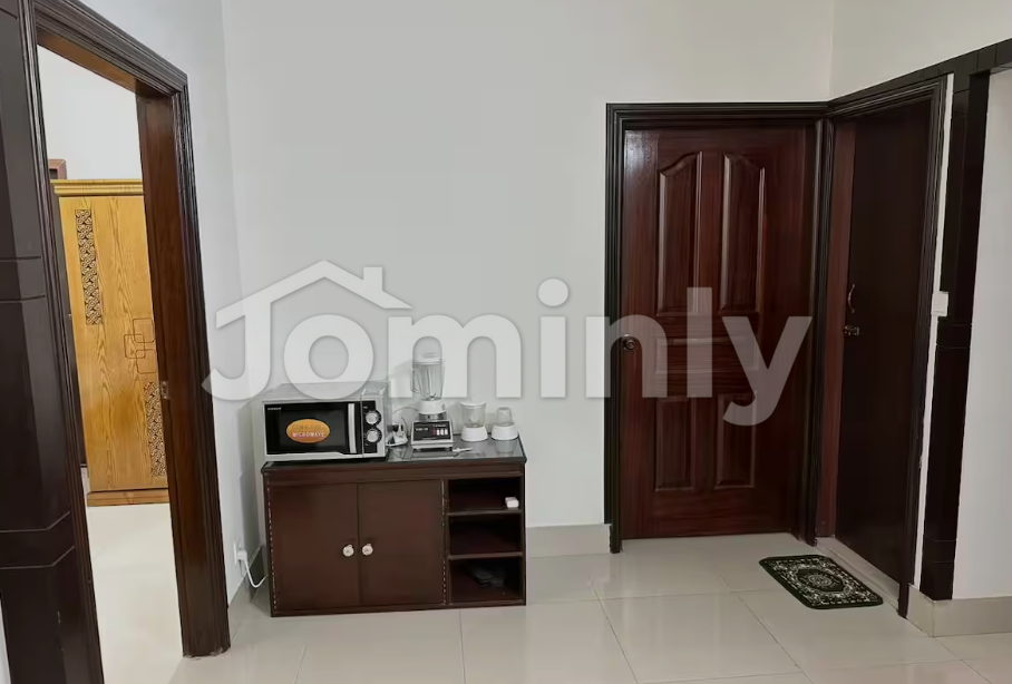 Modern 3-BR Serviced Apartment in Mohammadpur | Dedicated Workspace & Full Kitchen